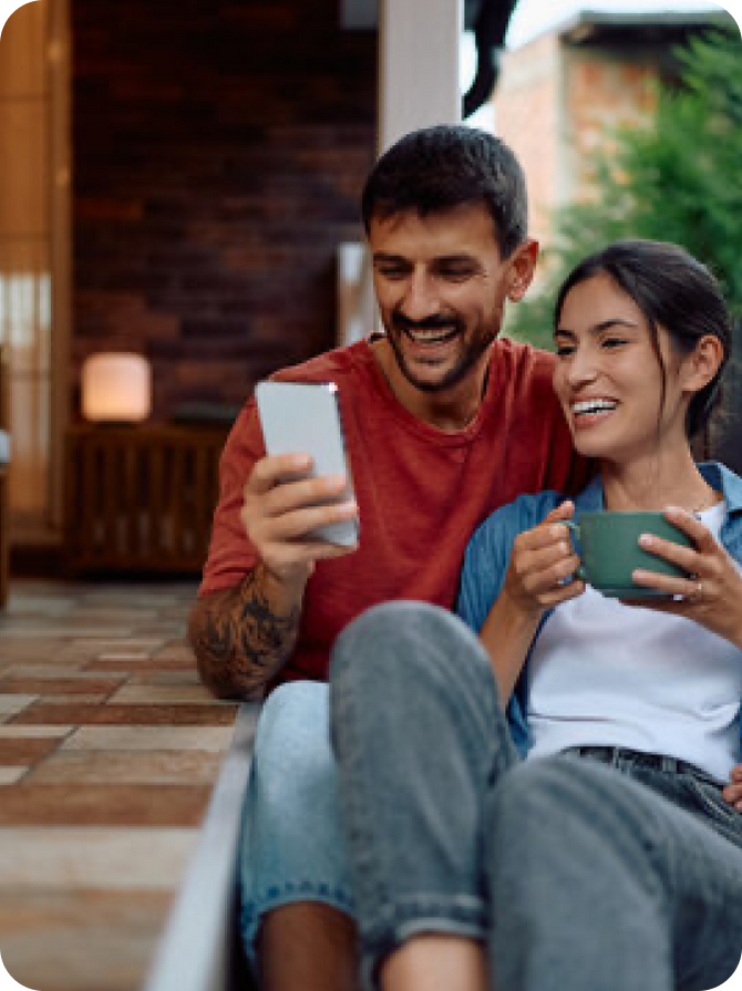 Couple looking at phone together